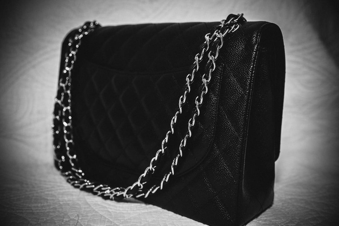 Photo of black classic handbag closeup